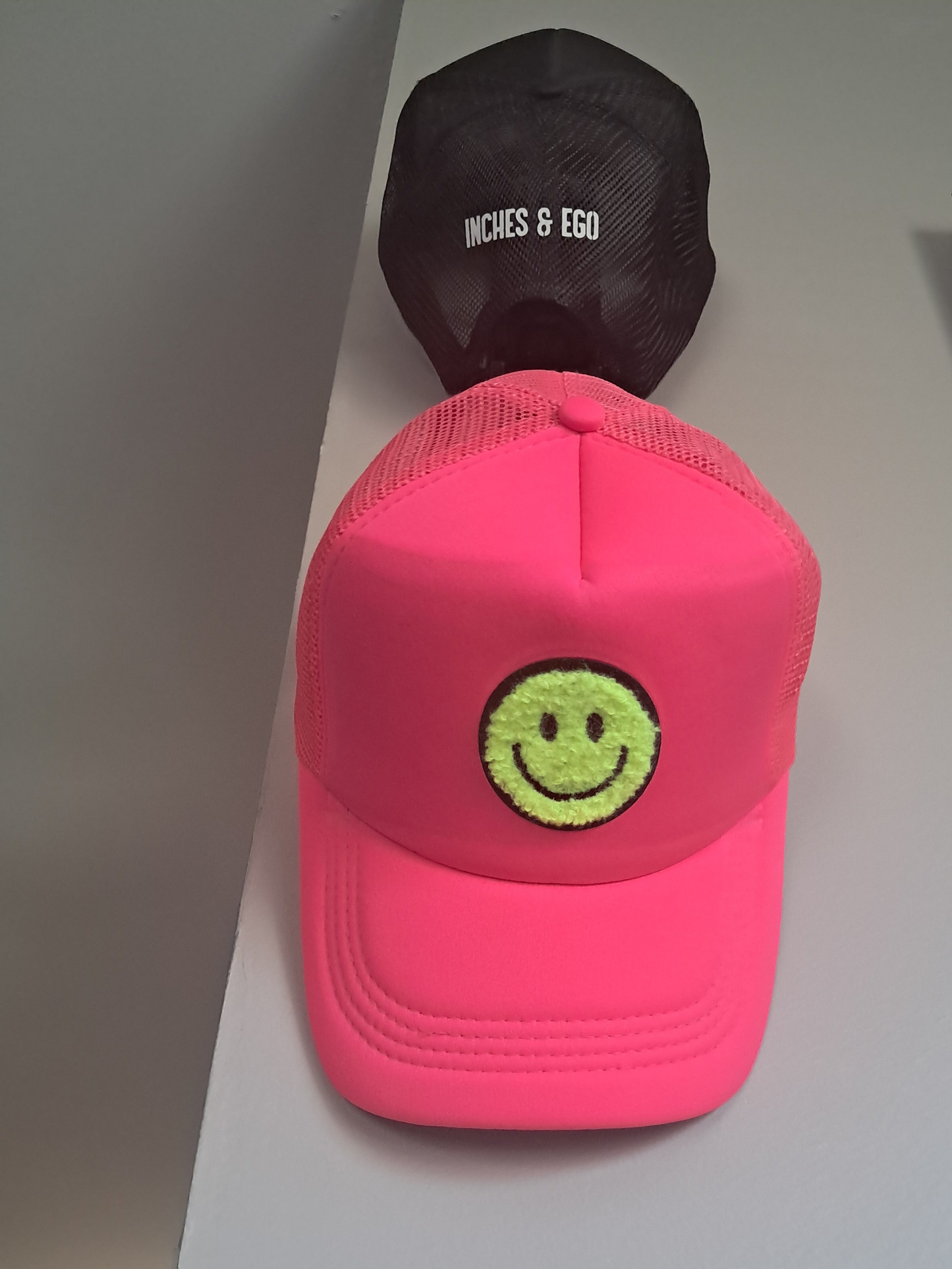 INCHES & EGO π Trucker hat